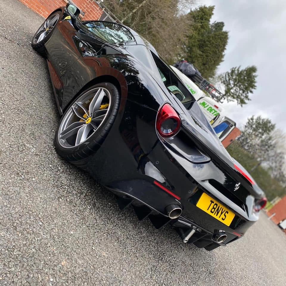 McLaren 600LT rear quarter in Paris Blue with carbon fibre diffuser