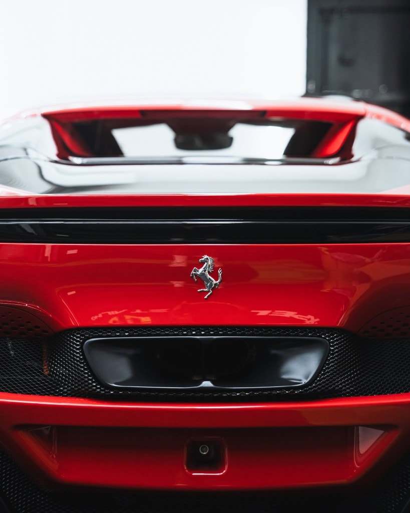 Lamborghini Aventador SVJ in Giallo Orion — rear with carbon wing