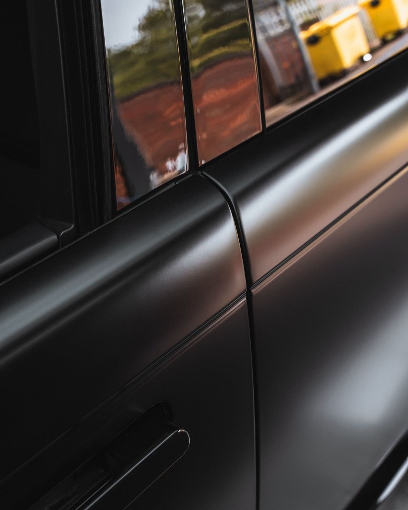 Ferrari 488 Spider interior — orange Alcantara bucket seats full view
