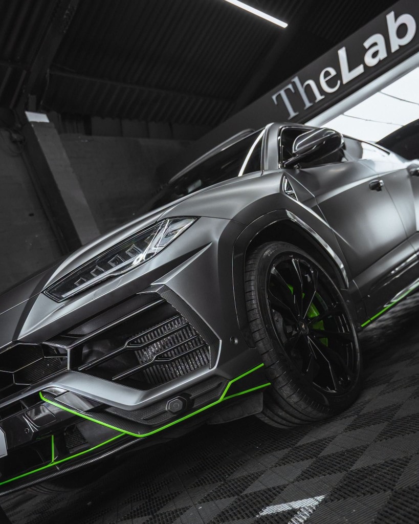 Lamborghini Urus 7 REX front — TheLab entrance dramatic framing
