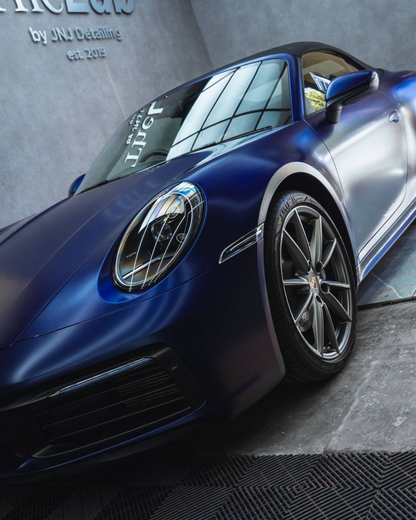 Porsche 911 Targa in blue — front angle inside TheLab studio