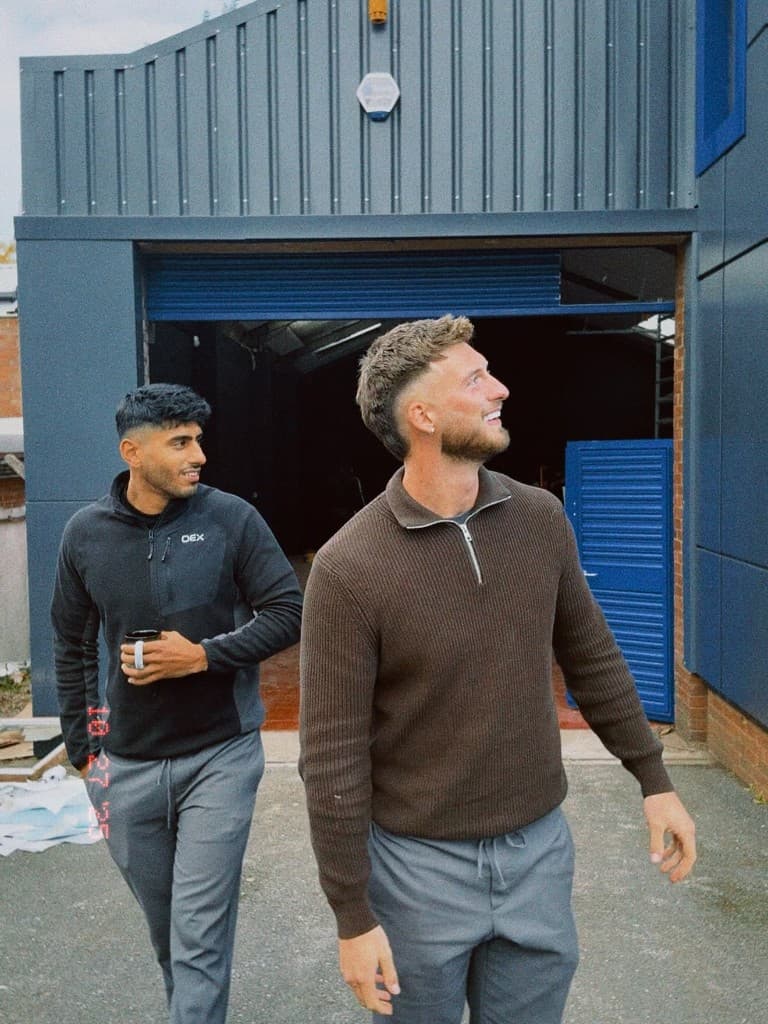 Joe and Jacob walking outside the JnJ studio
