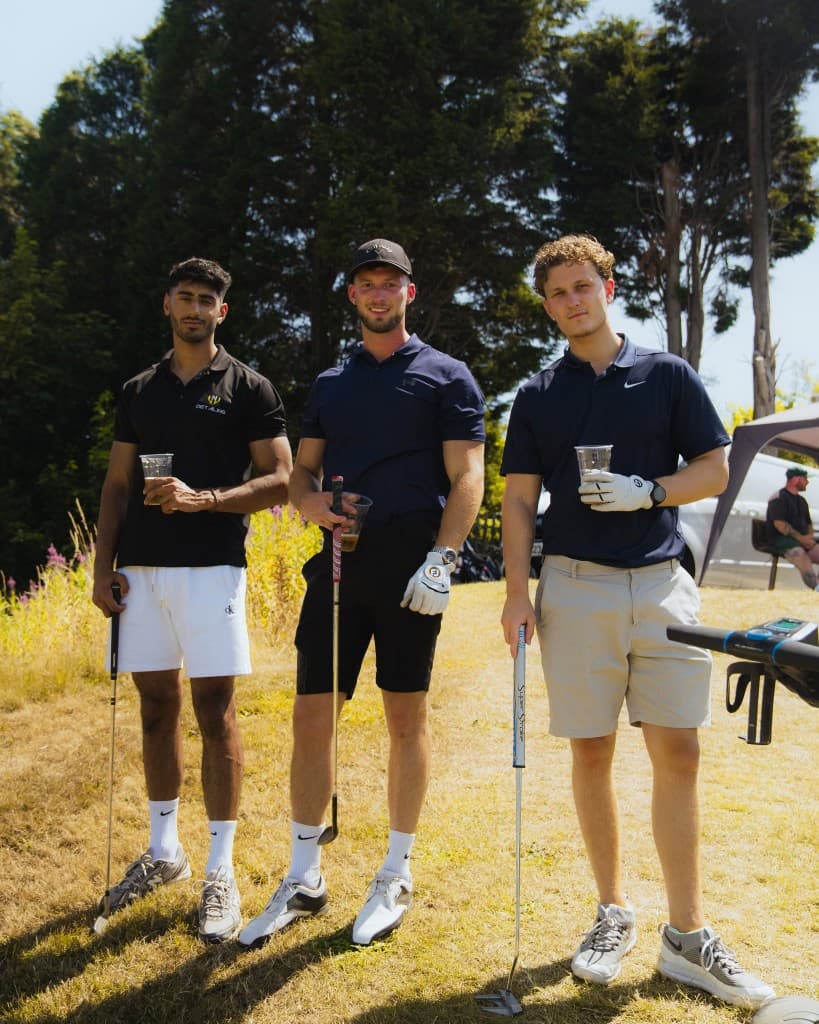 JnJ team enjoying a round of golf together — work-life balance