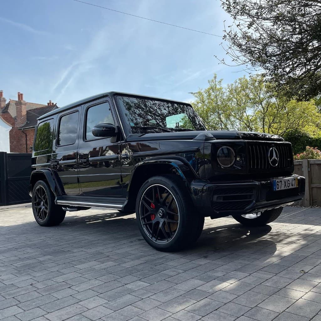 Range Rover Sport in matte black finished with full paint protection film under studio lighting